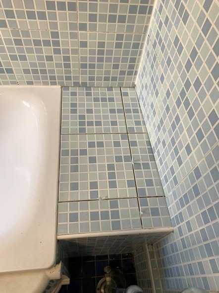 The bath side before the panel was refitted